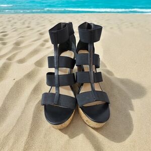 Steve Madden woman's size 9.5 5" platform heels with upper straps. Zip up backs.